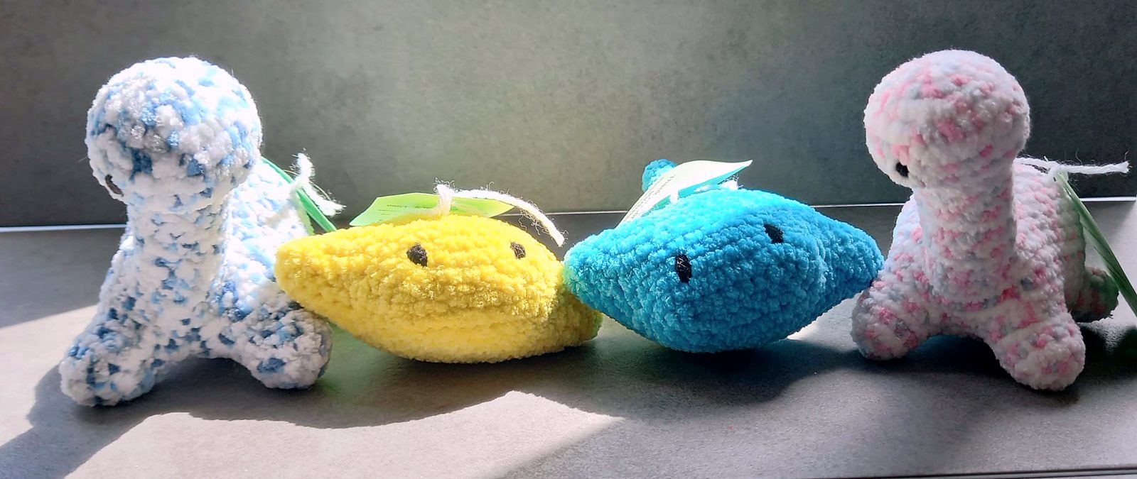 Crocheted dinosaurs and stingrays