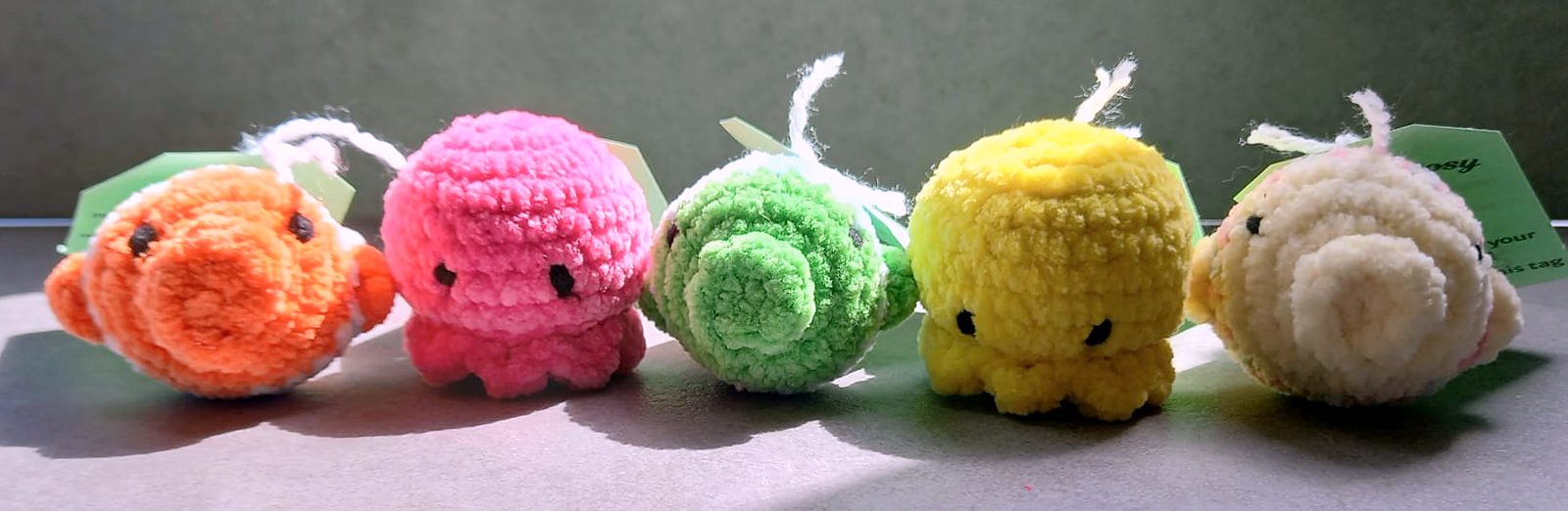 Little crocheted octopuses, a goldfish and a turtle